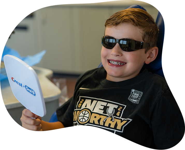 Young Male Cook Orthodontics Patient Wearing Sunglasses