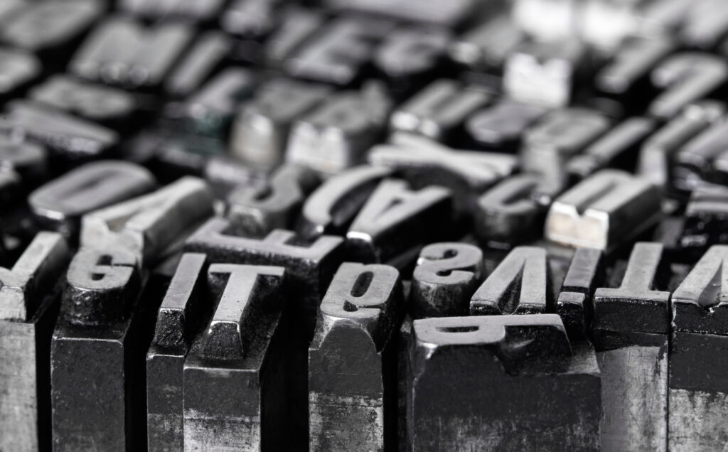 Close Up Of Metallic Typesetting Letters